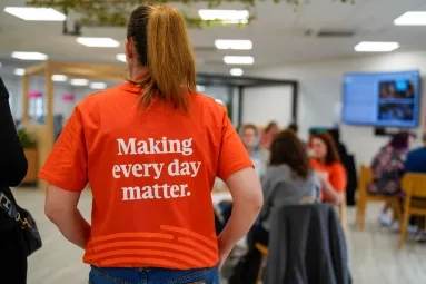 A member of staff at an event for health professionals